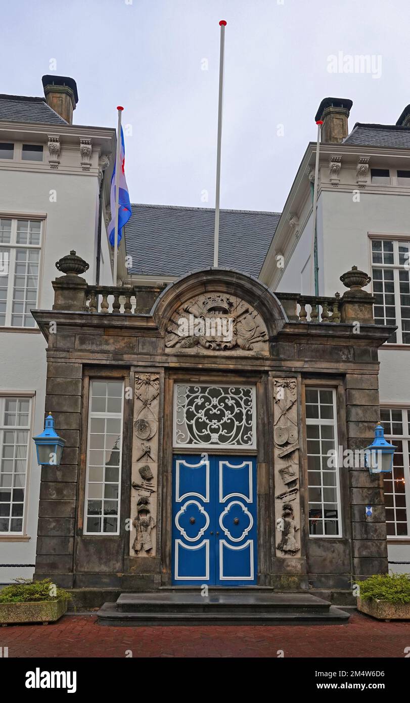 The front door of the old town hall in Zutphen, a hanseatic town in the Netherlands. This sandstone portico with rich sculptures was built in 1716. Stock Photo