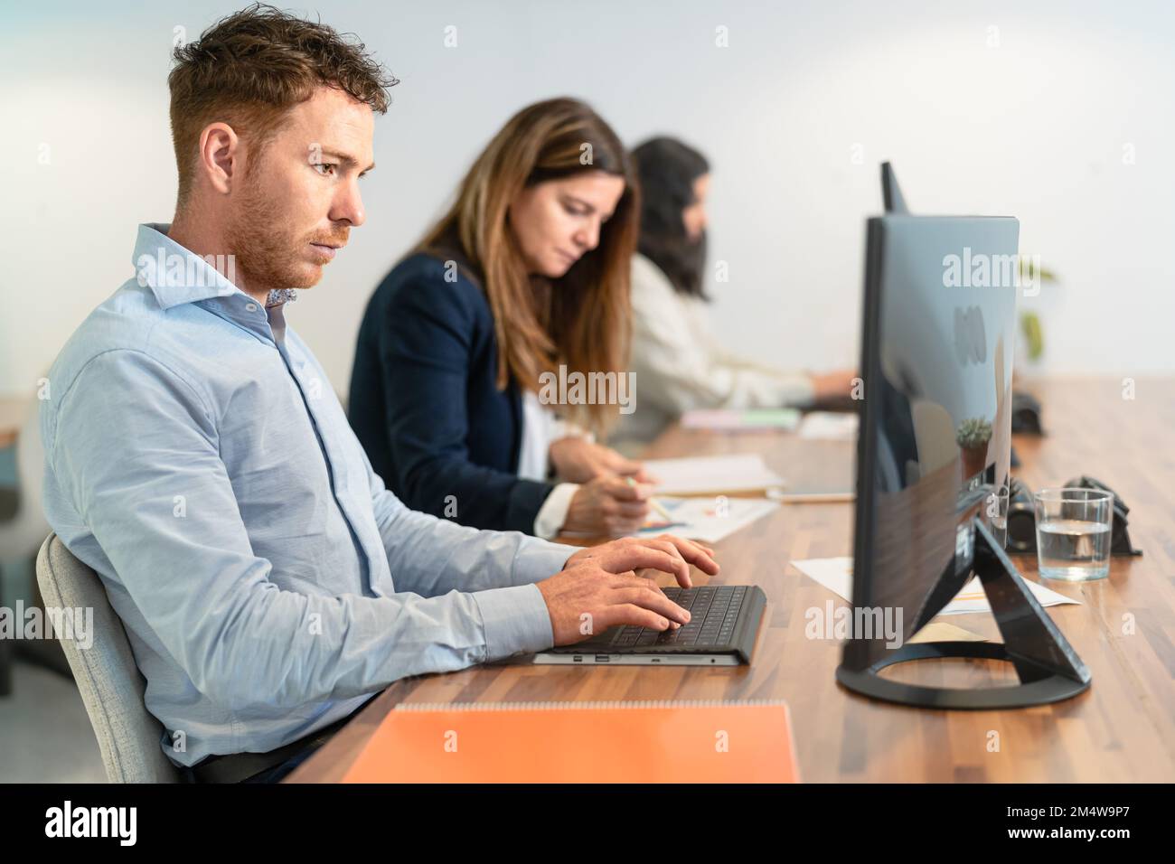 Business people working inside coworking creative space Stock Photo