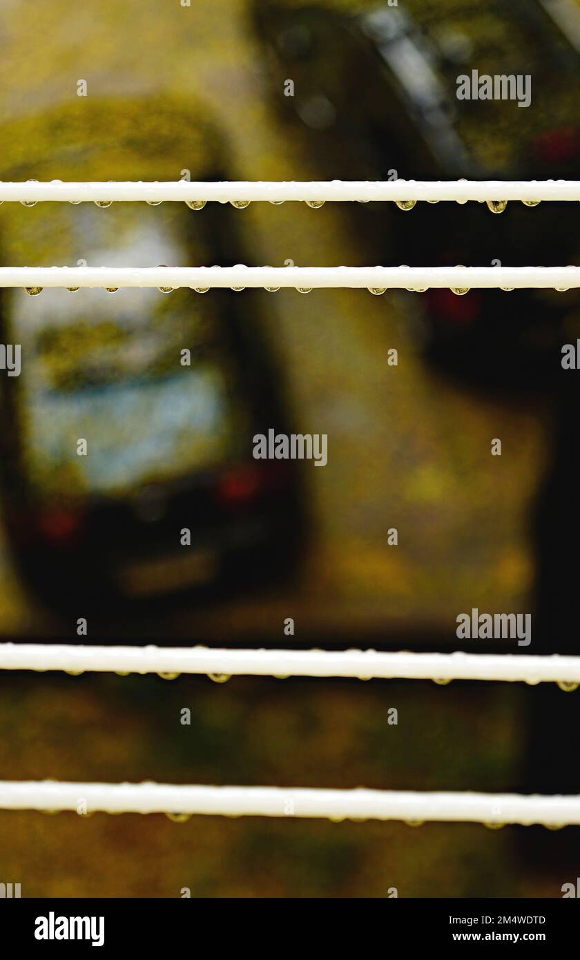 Drops of rain water on the ropes of a clothesline Stock Photo - Alamy