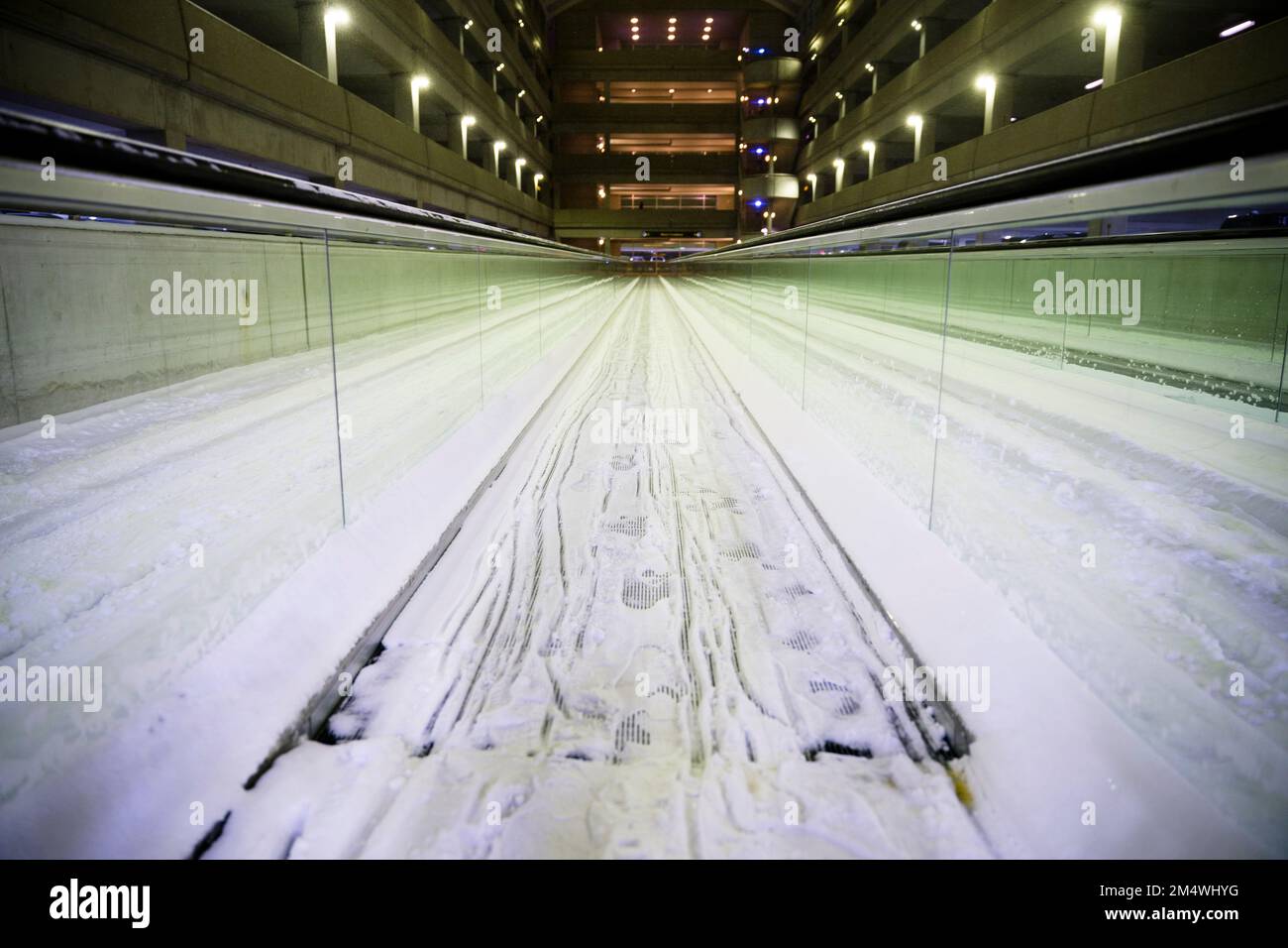 Columbus, Ohio, USA. 23rd Dec, 2022. A walkway in the parking garage of John Glenn Columbus International Airport in Columbus, Ohio is frozen to a standstill as a major winter storm brings subzero temperatures across the United States. (Credit Image: © Jintak Han/ZUMA Press Wire) Stock Photo