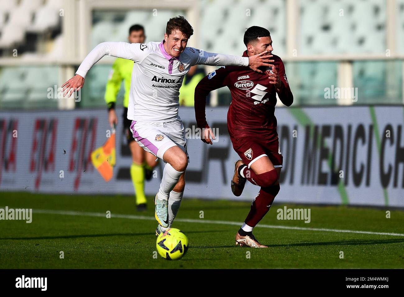 Turin, Italy. 23 December 2022. Jack Hendry of US Cremonese competes for the bll with Nemanja Radonjic of Torino FC during the friendly football match between Torino FC and US Cremonese. Credit: Nicolò Campo/Alamy Live News Stock Photo