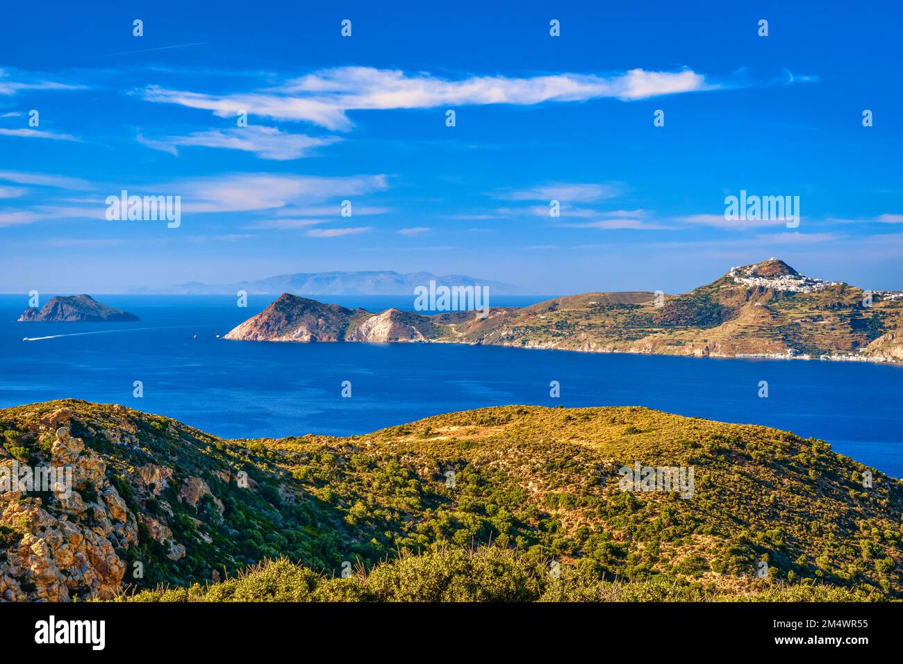 Beautiful landscape, islets in bay, rich greenery, sunny summer day, Greek island, Mediterranean sea, travel and vacation Stock Photo