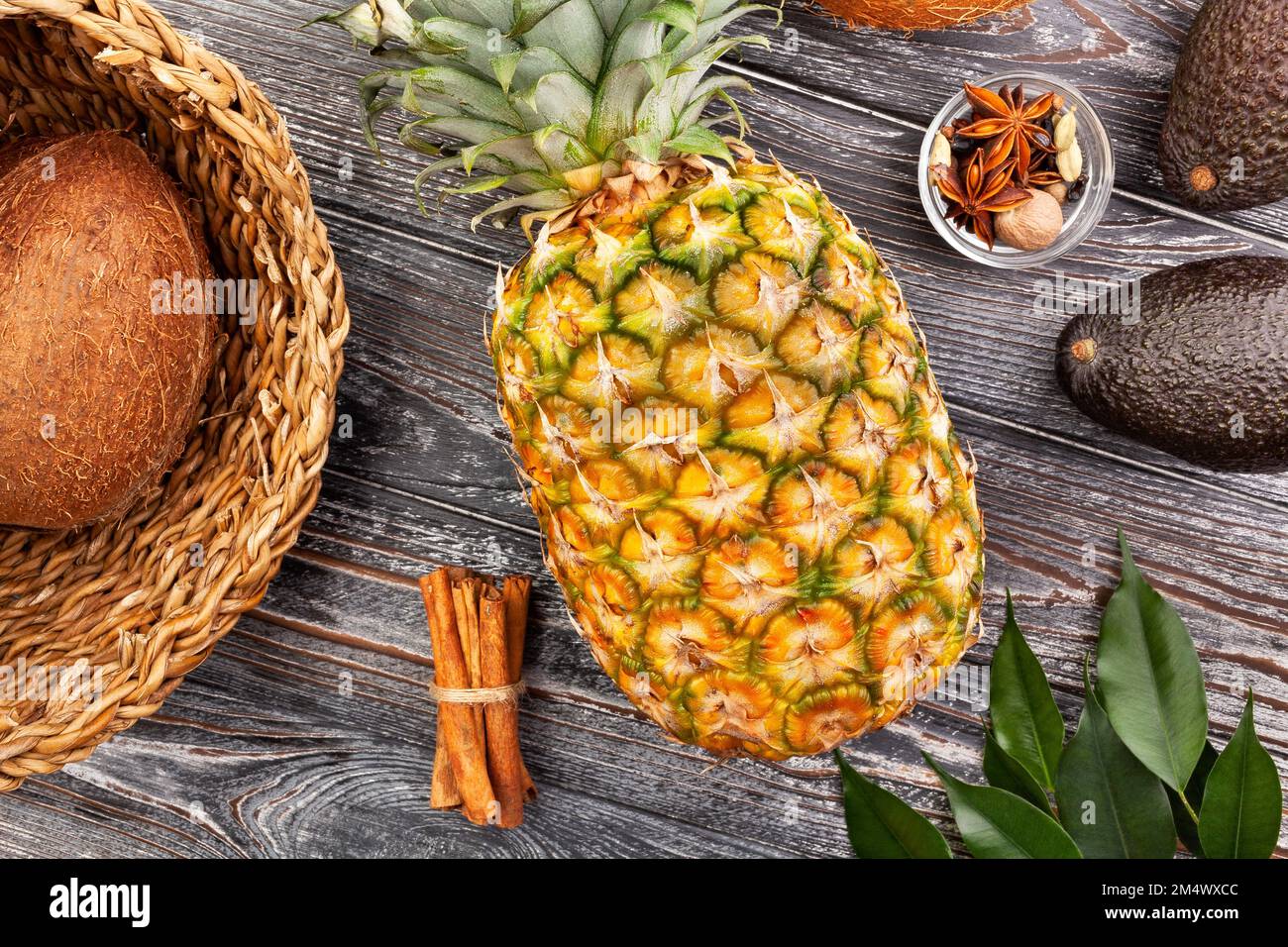 yellow pineapple on wood background Stock Photo