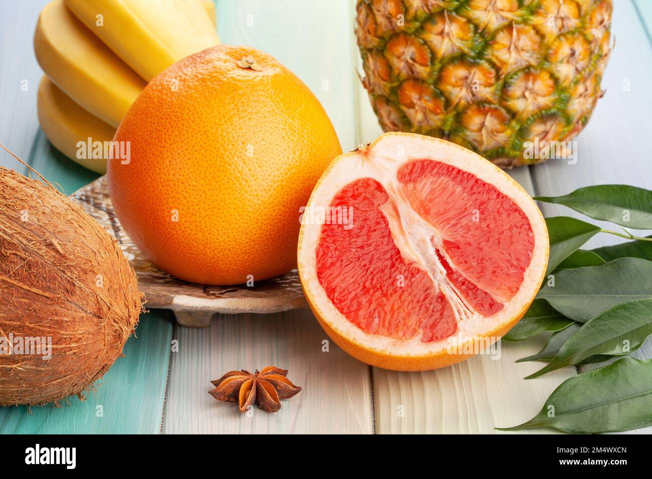 sliced grapefruit on wood background Stock Photo