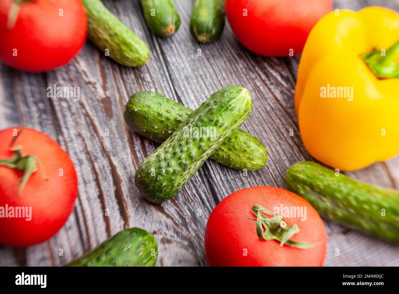 pickling cucumber on wood background Stock Photo
