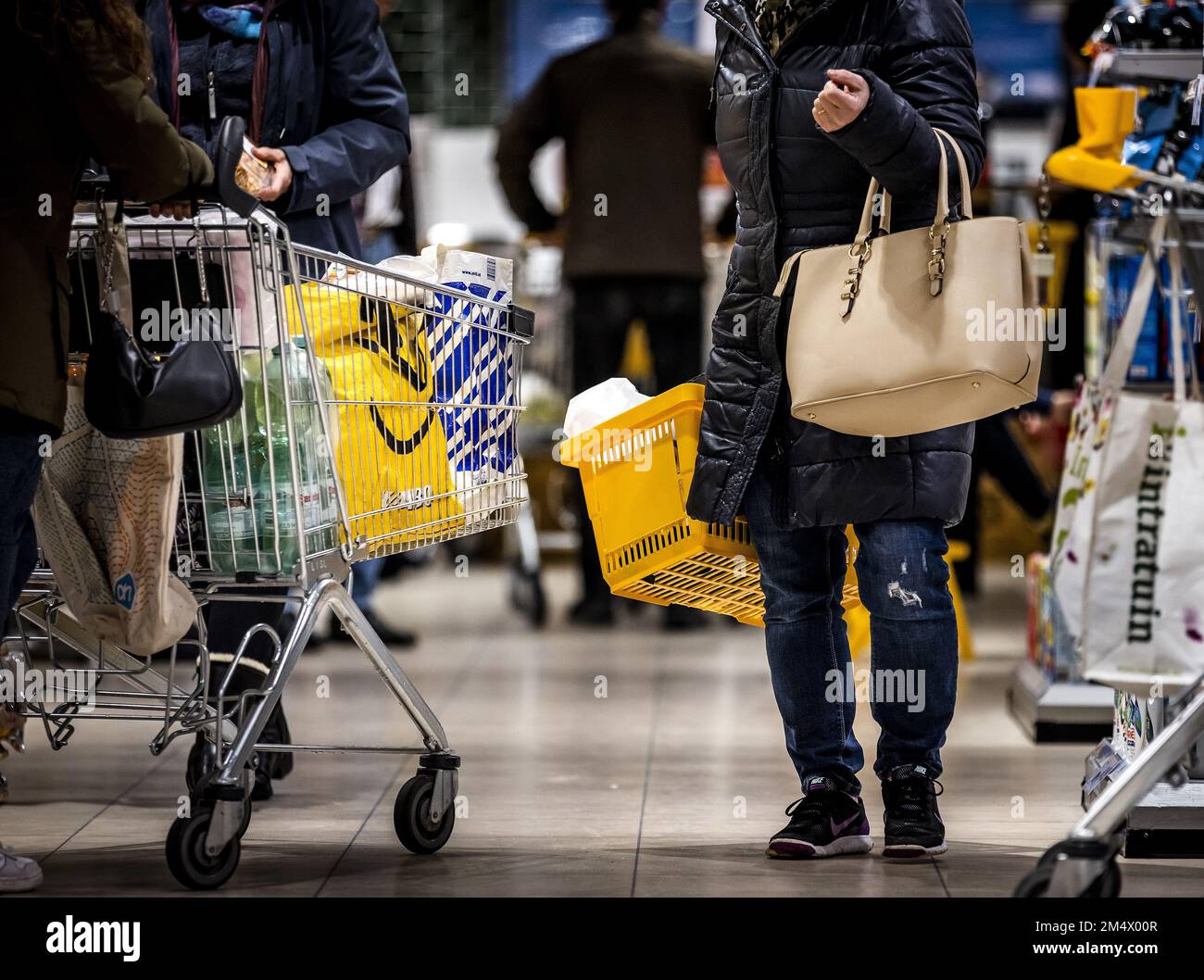 AMSTELVEEN Shoppers in a supermarket. More and more supermarkets are