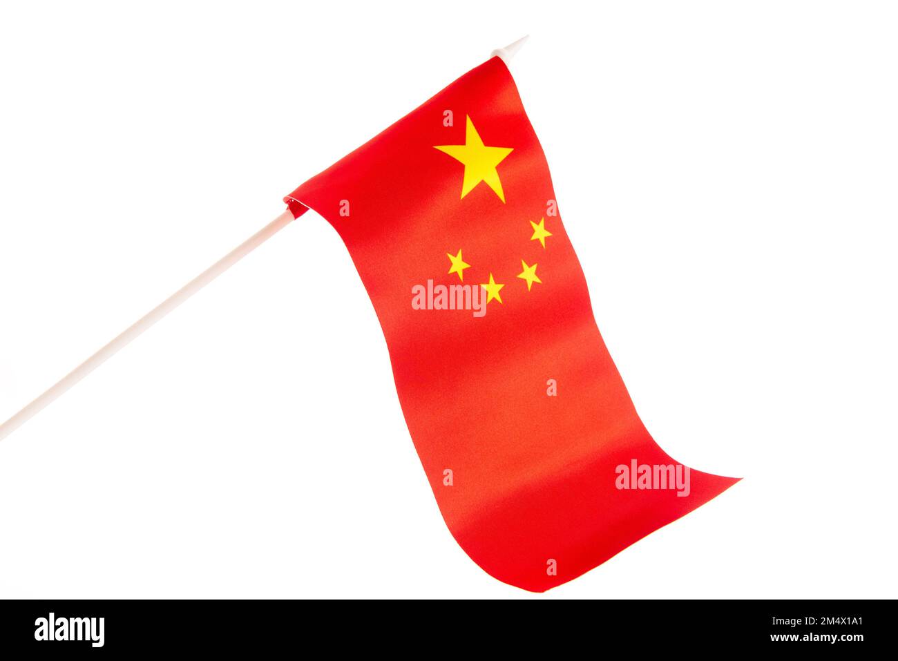 Top view flag of the Peoples Republic of China isolate with copy space on white background. The flag of China on a white background developing and Stock Photo
