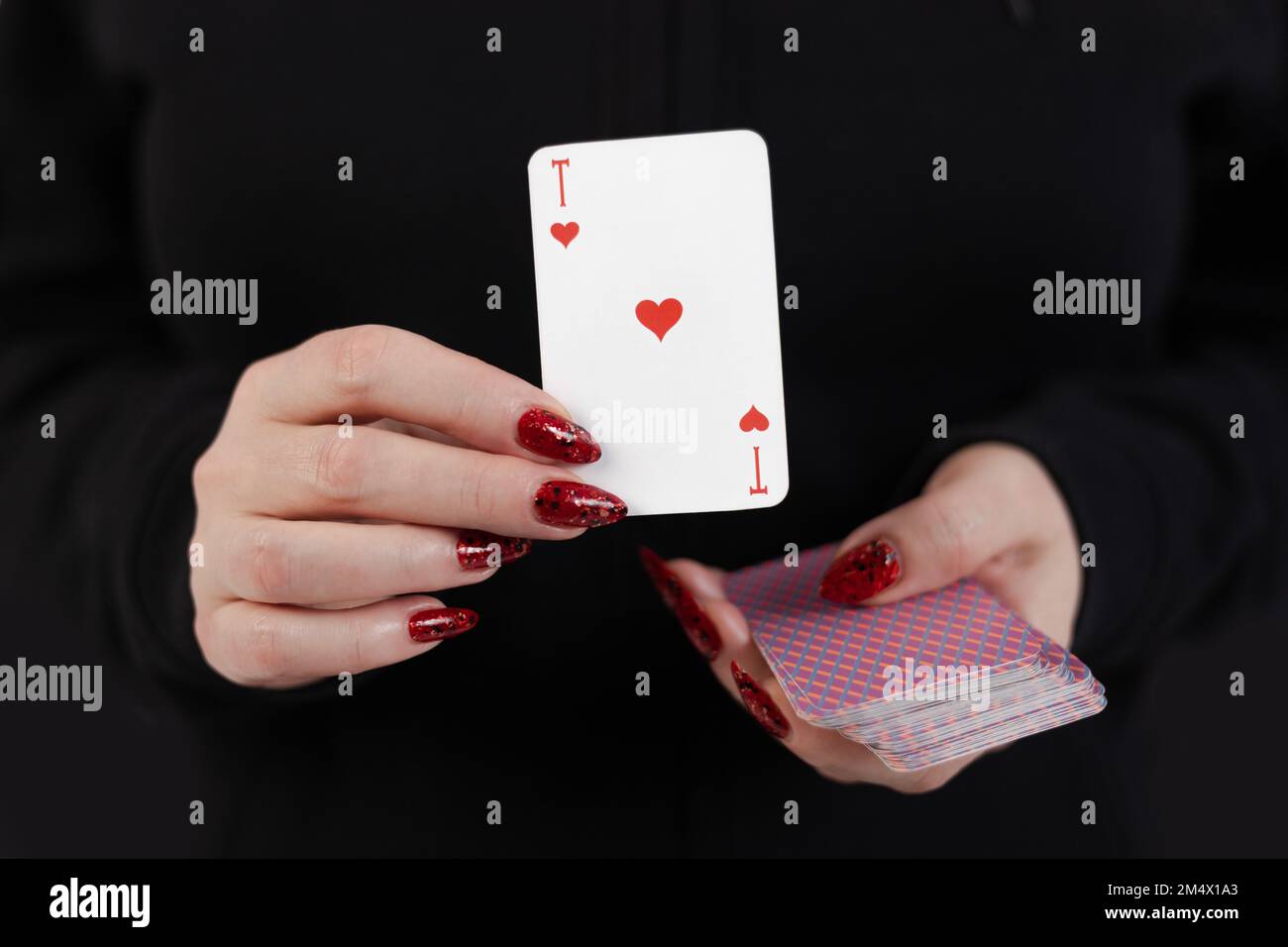 Female hands hold a deck of cards and show tricks Stock Photo - Alamy