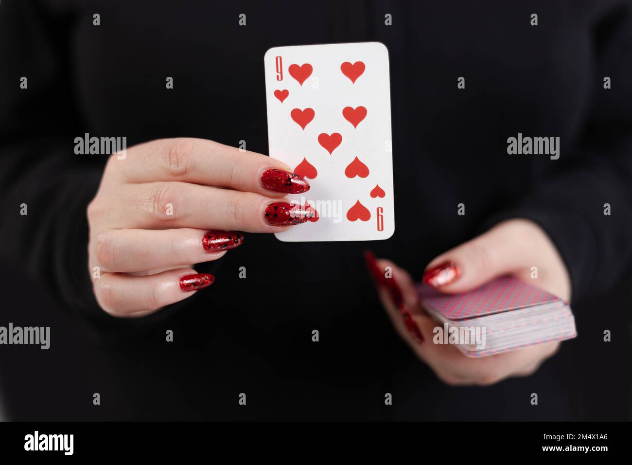 Female hands hold a deck of cards and show tricks Stock Photo - Alamy