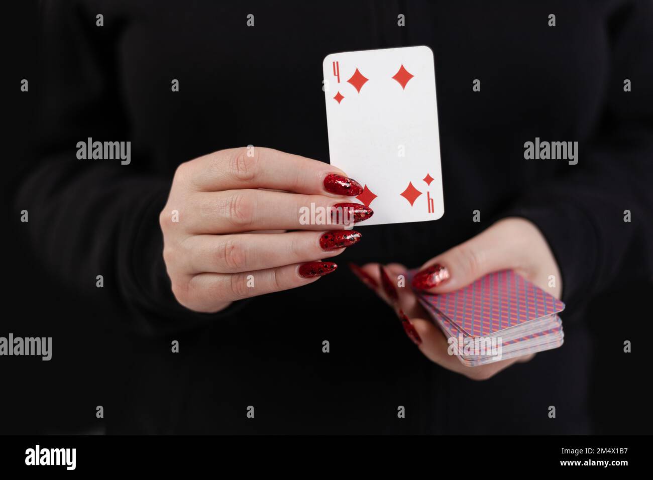 Female hands hold a deck of cards and show tricks Stock Photo - Alamy