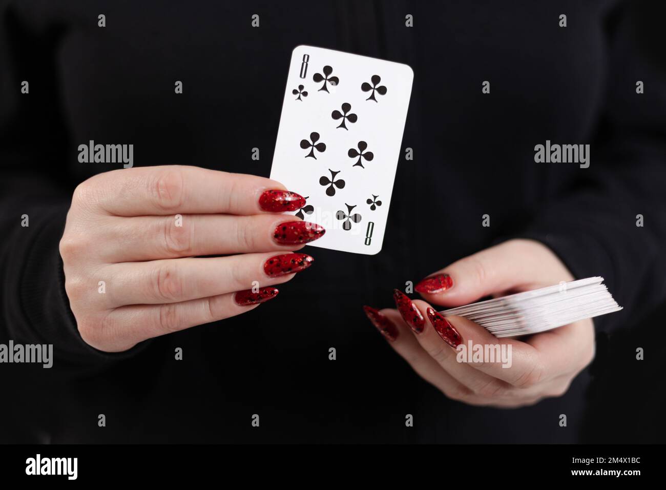 Female hands hold a deck of cards and show tricks Stock Photo - Alamy