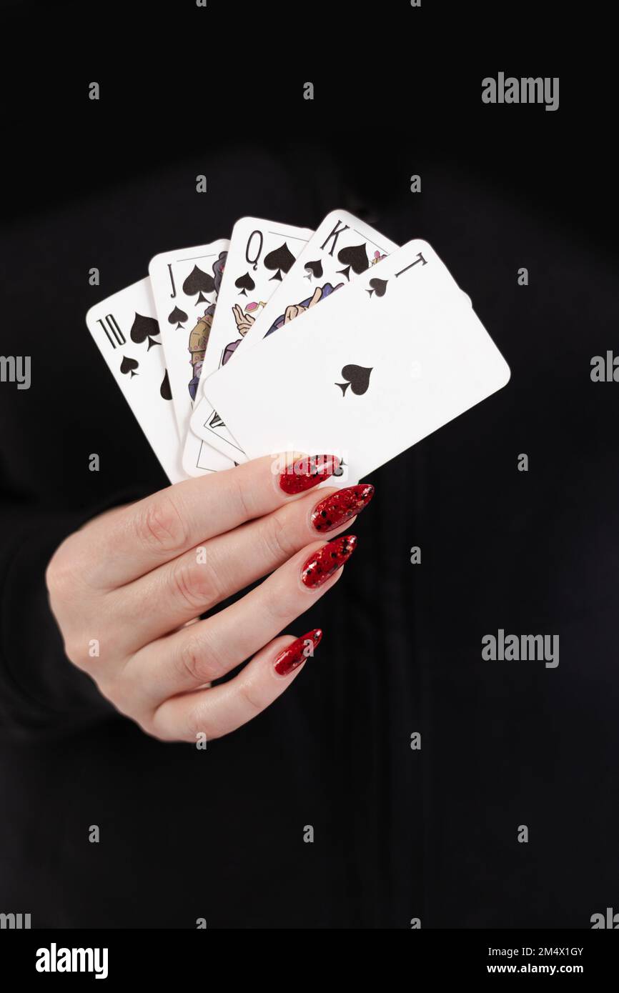 Female hands hold a deck of cards and show tricks Stock Photo - Alamy