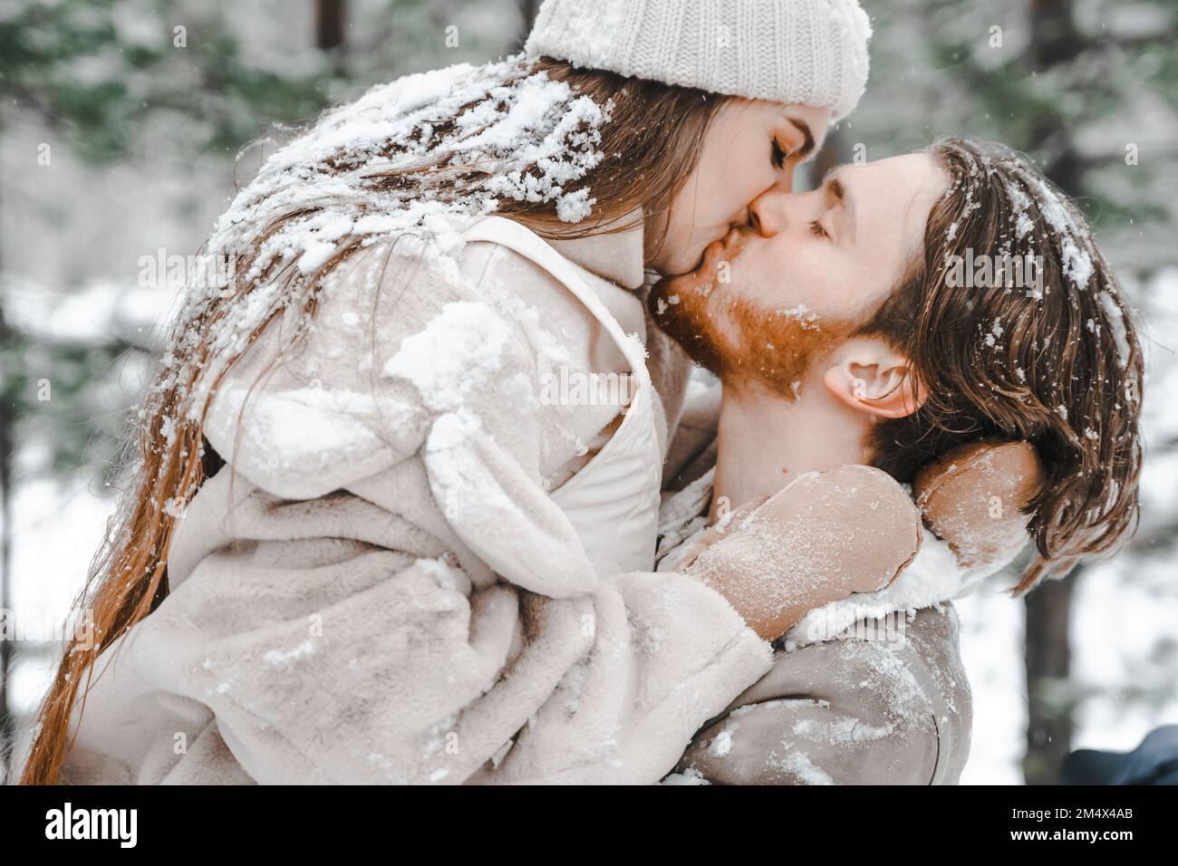 Romantic Snow Love Storyyoung Couple Guy Girl Playing Kissing In Snowy Winter Forest With Trees