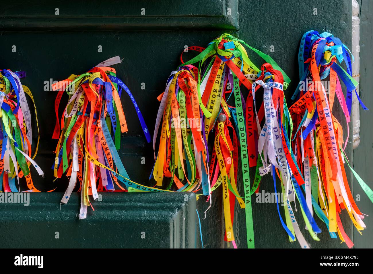 Famous and colorful ribbons of our lord do Bonfim which is believed to bring luck and are traditional in the city of Salvador in Bahia. Stock Photo