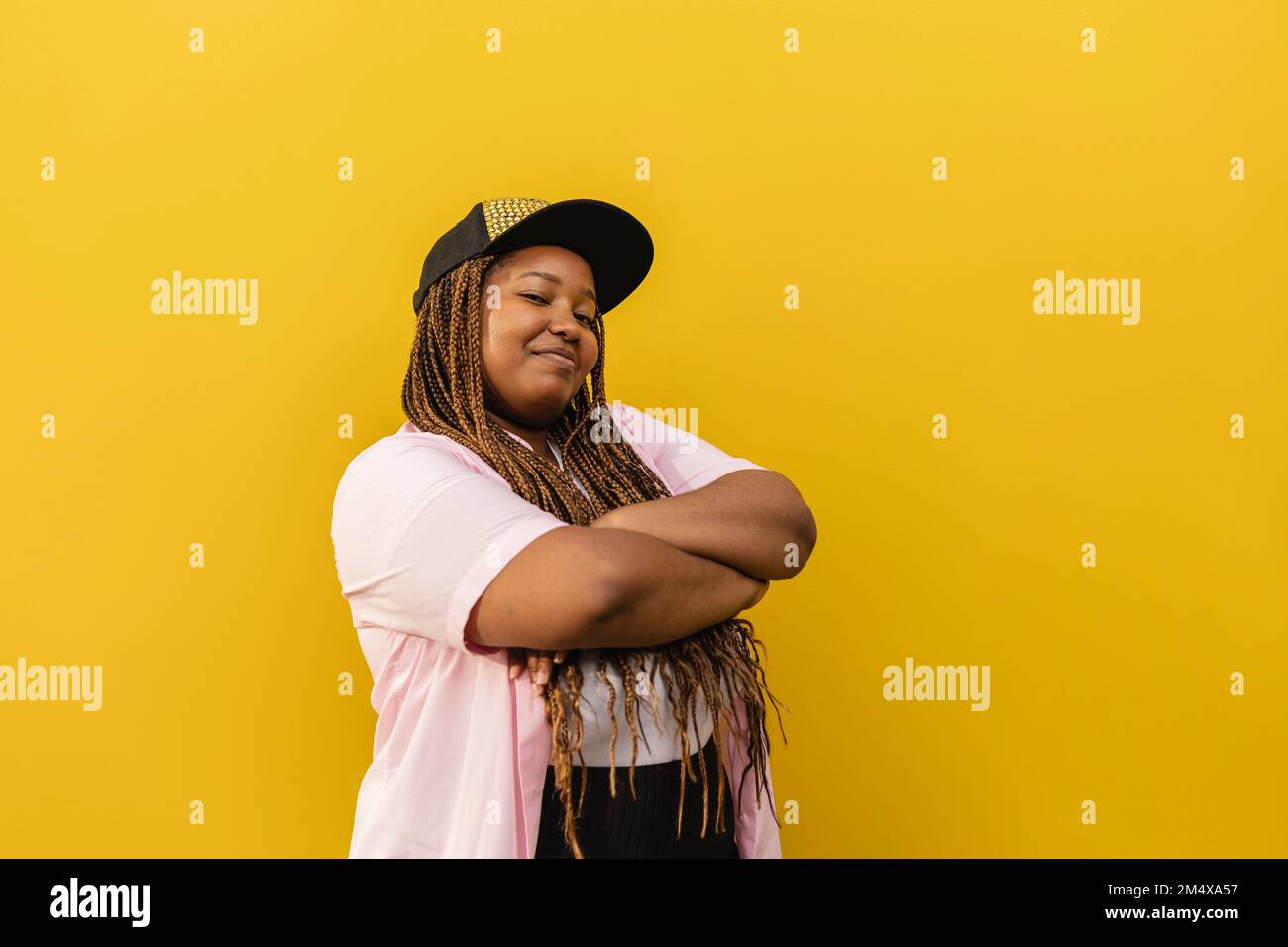 Confident african woman arms hi-res stock photography and images - Alamy