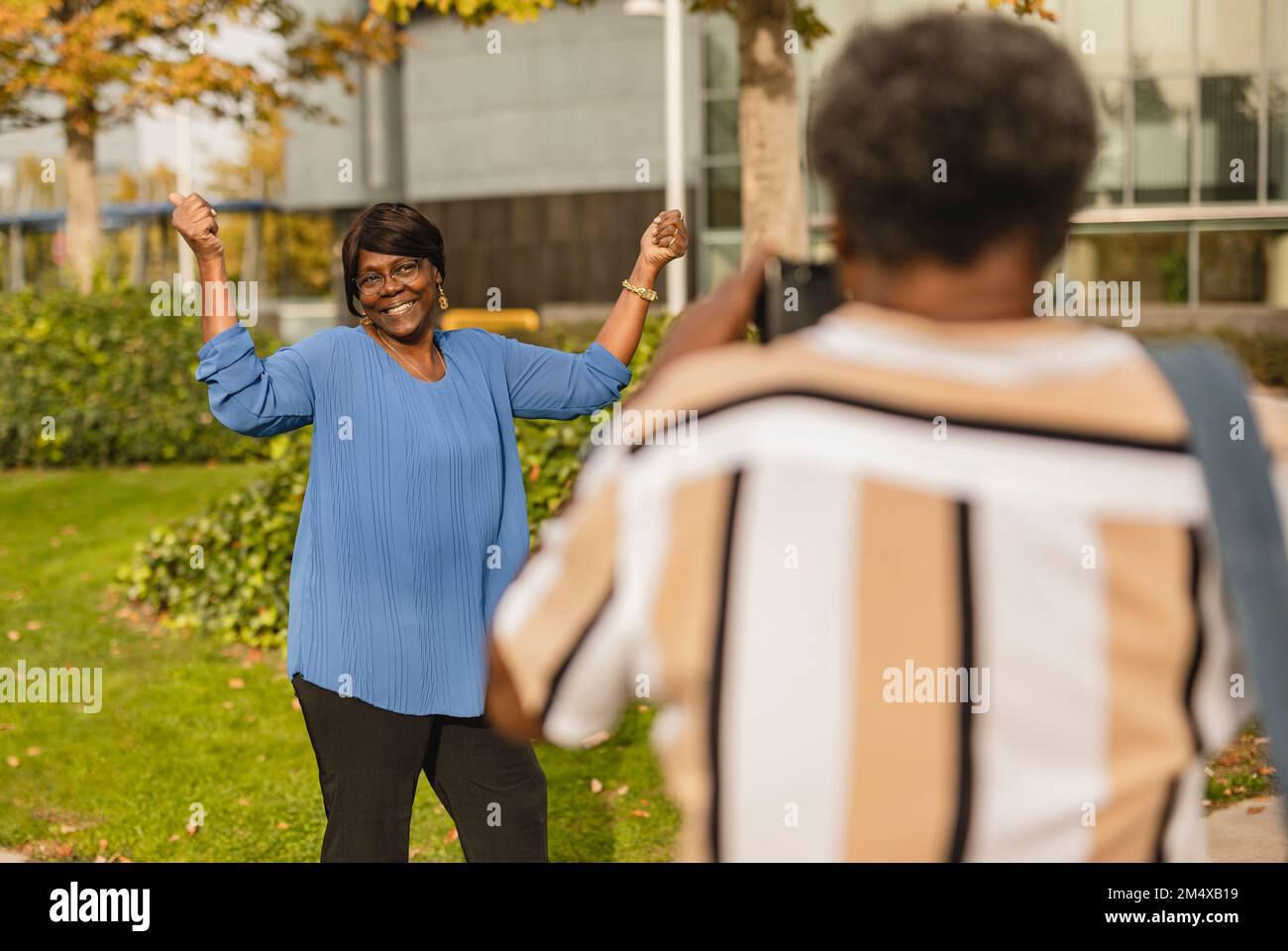 Cheerful african man gesturing hi-res stock photography and images - Alamy
