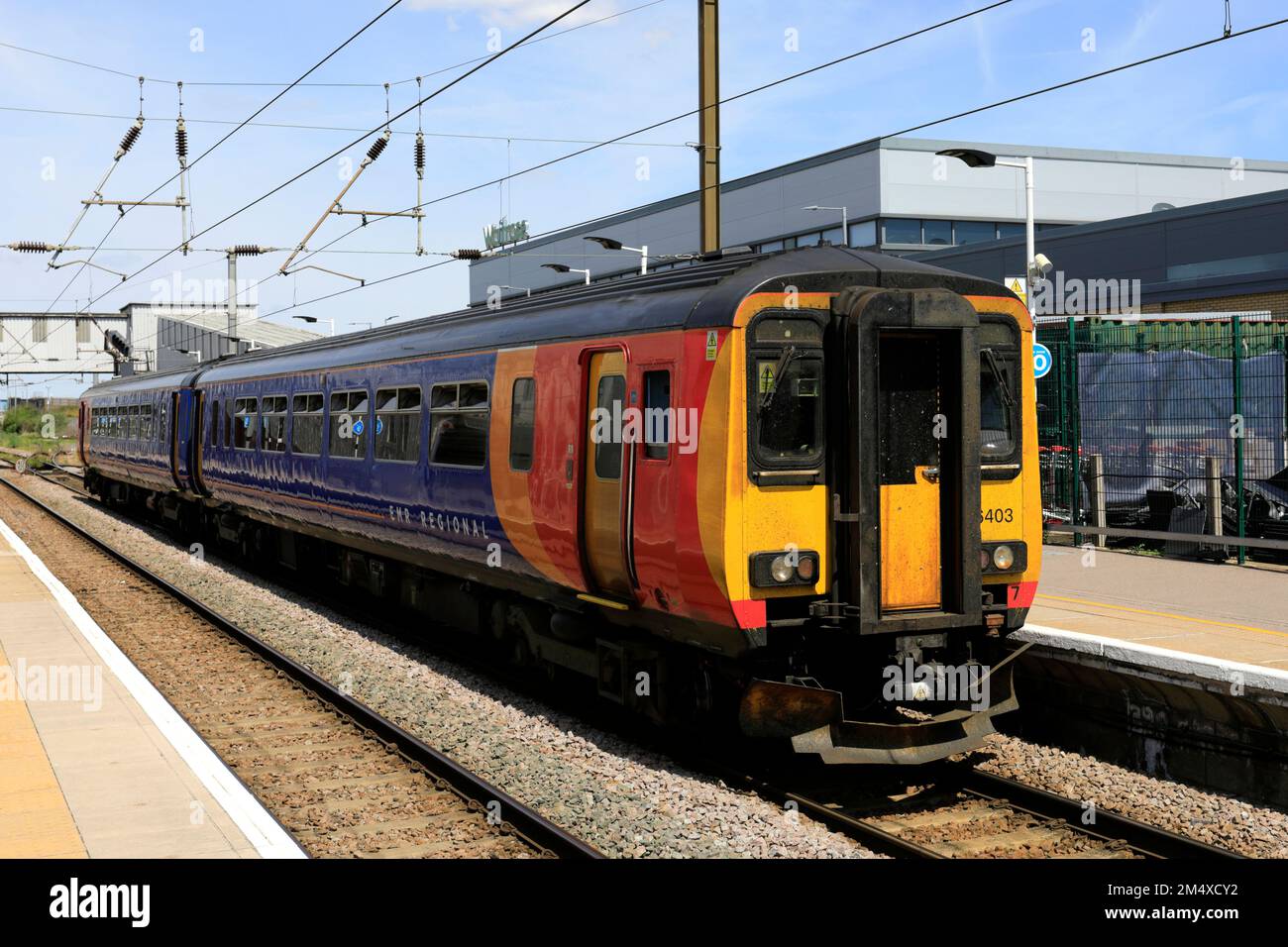 EMR Regional trains 156403 at Peterborough railway station, East Coast ...