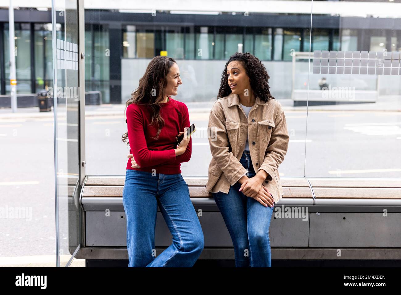 Two people talking bus hi-res stock photography and images - Alamy