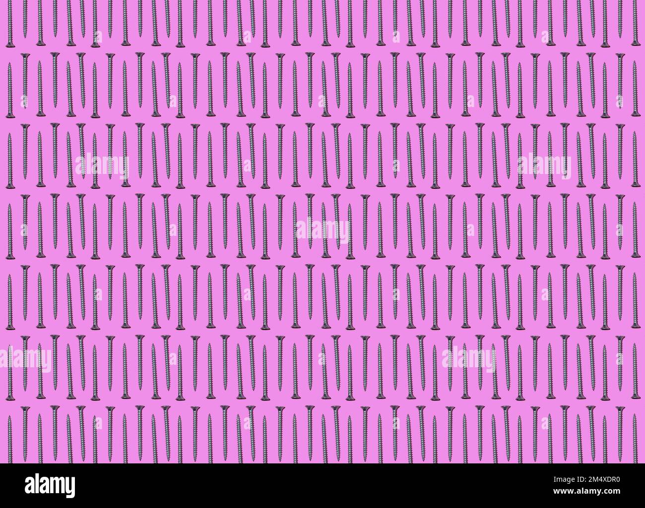 Screw Rows Design Pattern of rows of screws flat laid against pink background Stock Photo ...