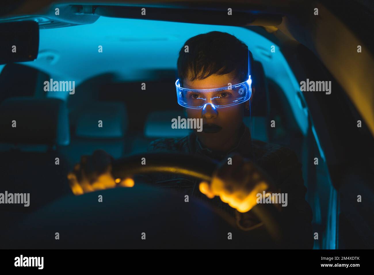 Woman wearing smart glasses driving car Stock Photo Alamy