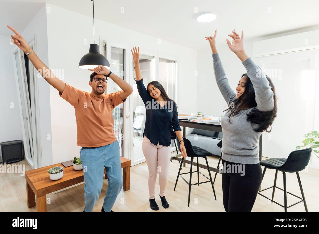 Carefree man dancing arms hi-res stock photography and images - Alamy