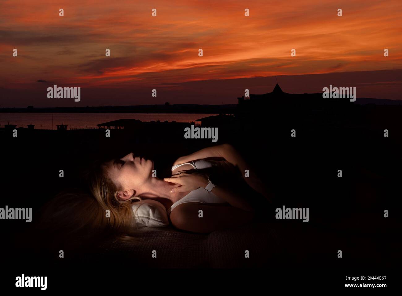 Woman relaxing nature eyes closed hi-res stock photography and images ...