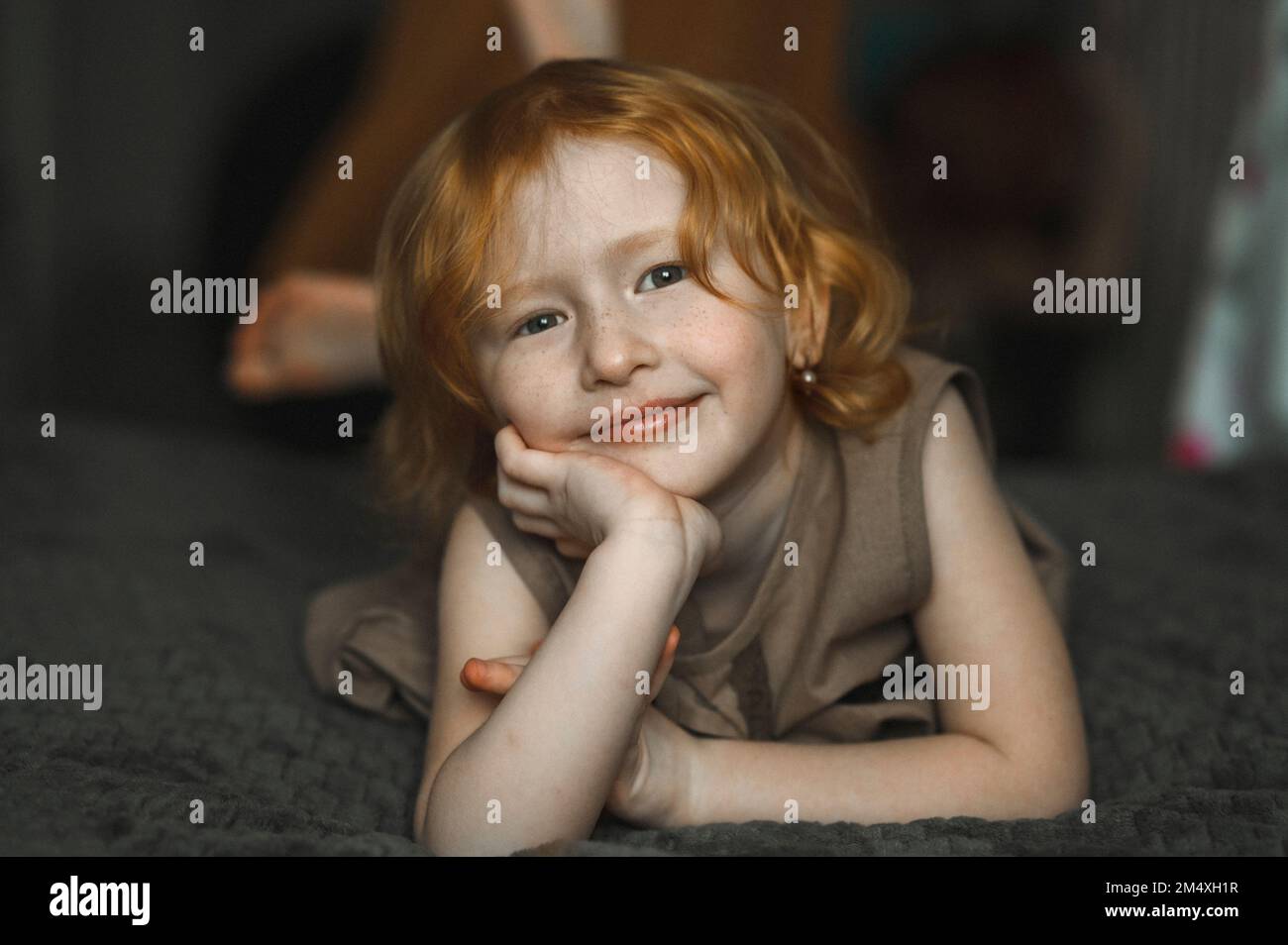 Cute girl lying on hi-res stock photography and images - Alamy