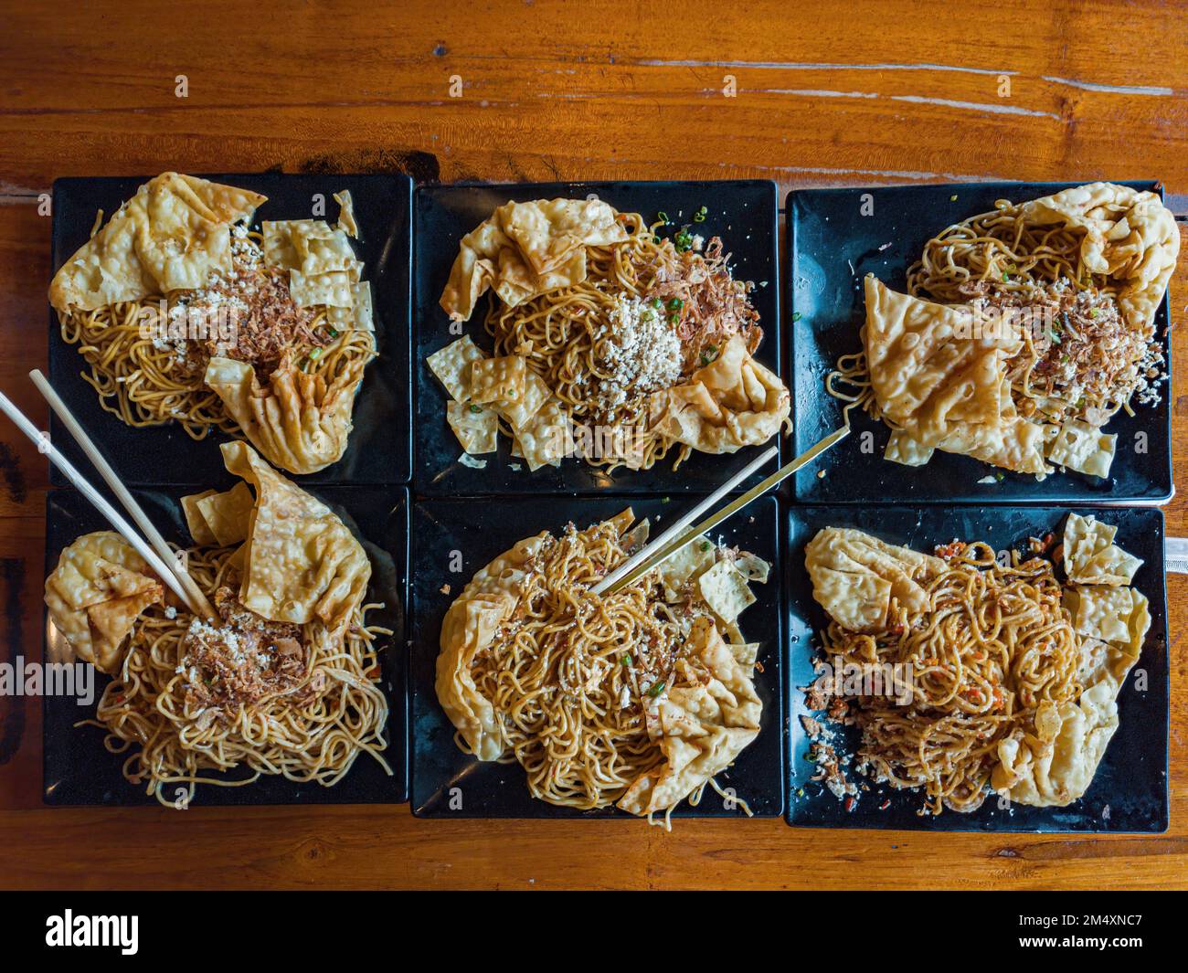 Mie Gacoan Restaurant, Semarang City, Central Java, Indonesia - 18 December 2022: Six Plates of Fried noodle of Mie Gacoan Stock Photo