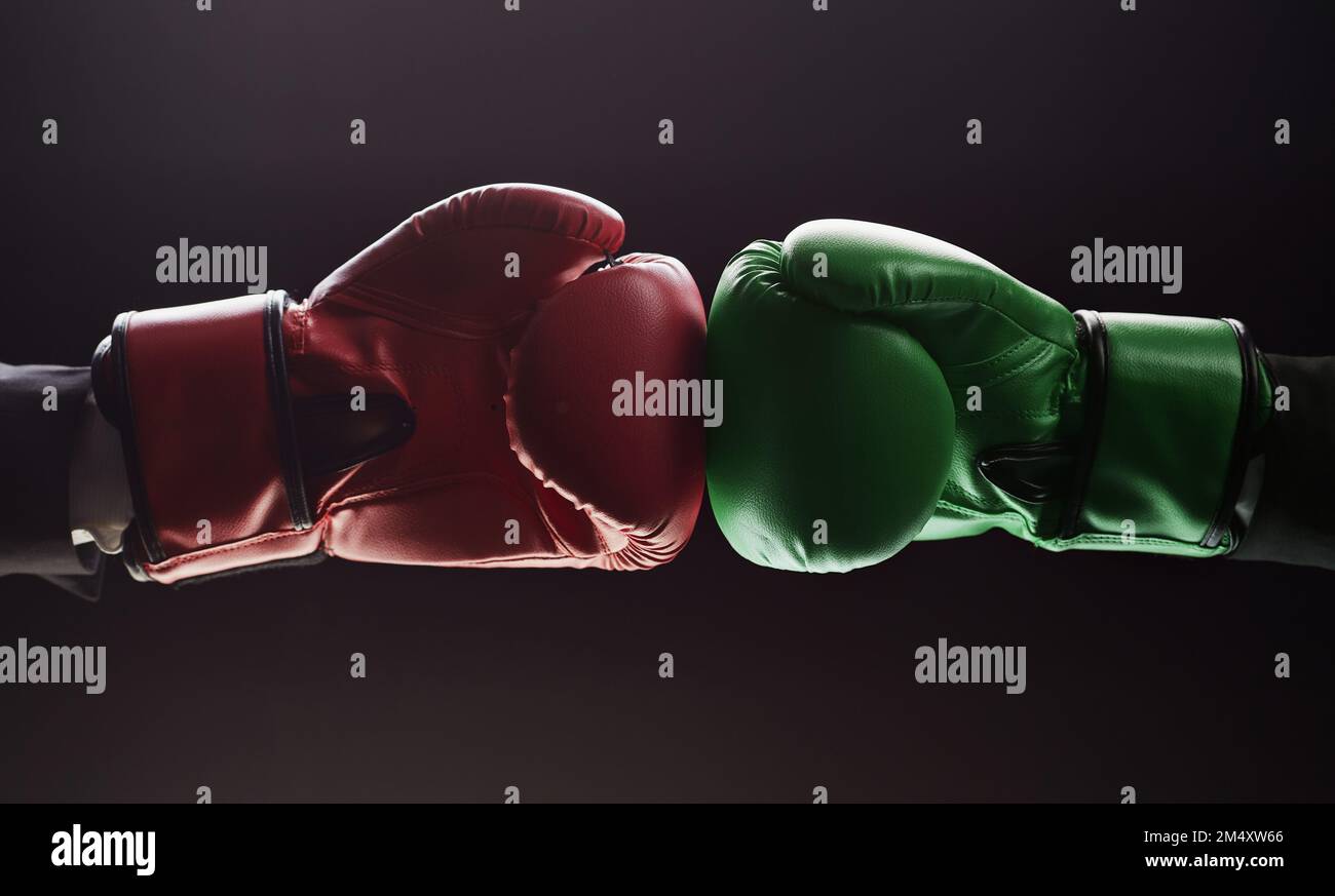 Two men's hands in boxing gloves. Confrontation concept Stock Photo