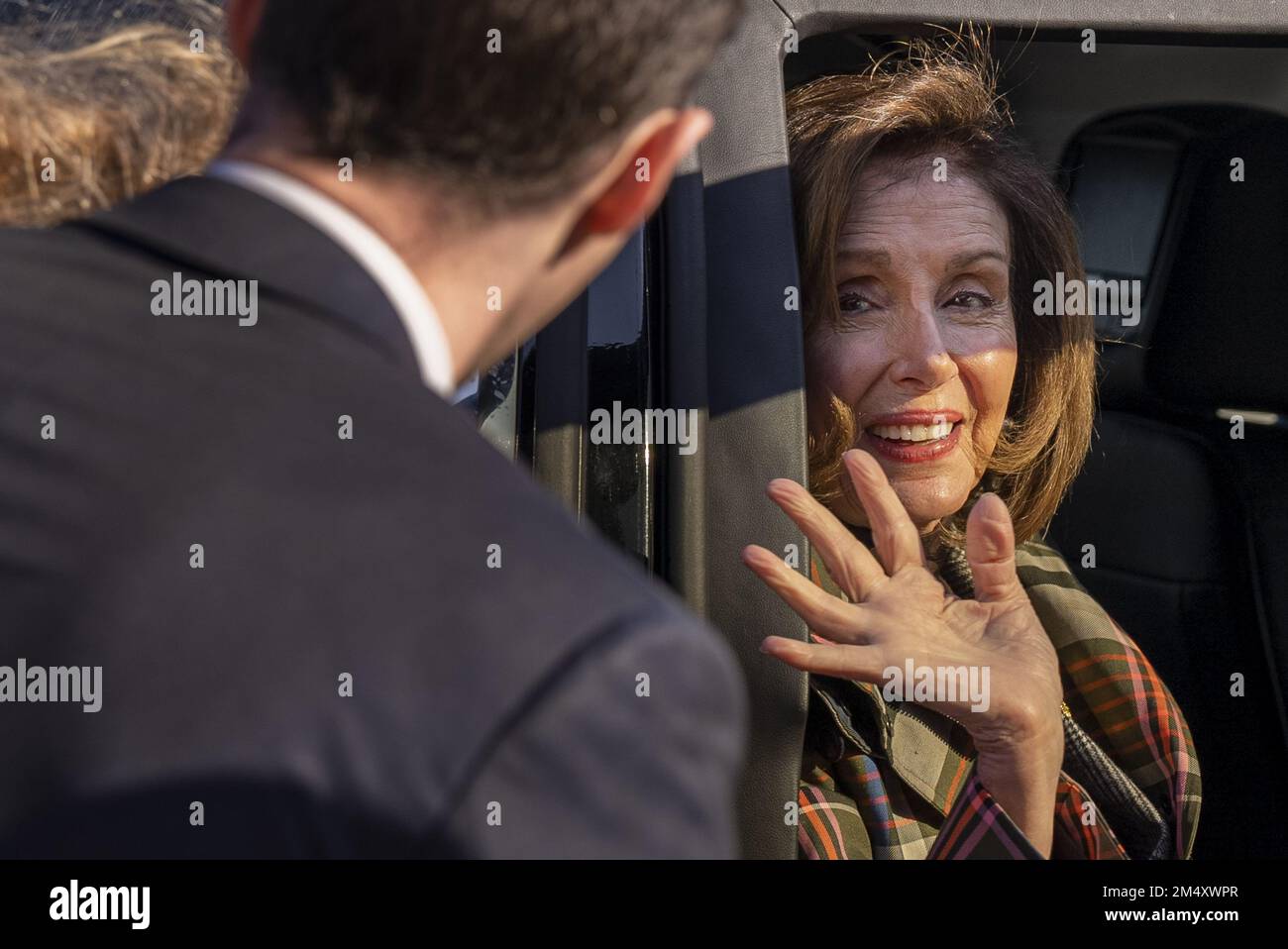 Washington DC, USA. 23rd Dec, 2022. Speaker of the United States House of Representatives Nancy Pelosi D-CA., waves bye to staff from her vehicle on Capitol Hill in Washington, DC on Friday, December 23, 2022. Pelosi will no longer be Speaker of the House once Republicans are a majority of the House next year. Photo by Ken Cedeno/UPI Credit: UPI/Alamy Live News Stock Photo