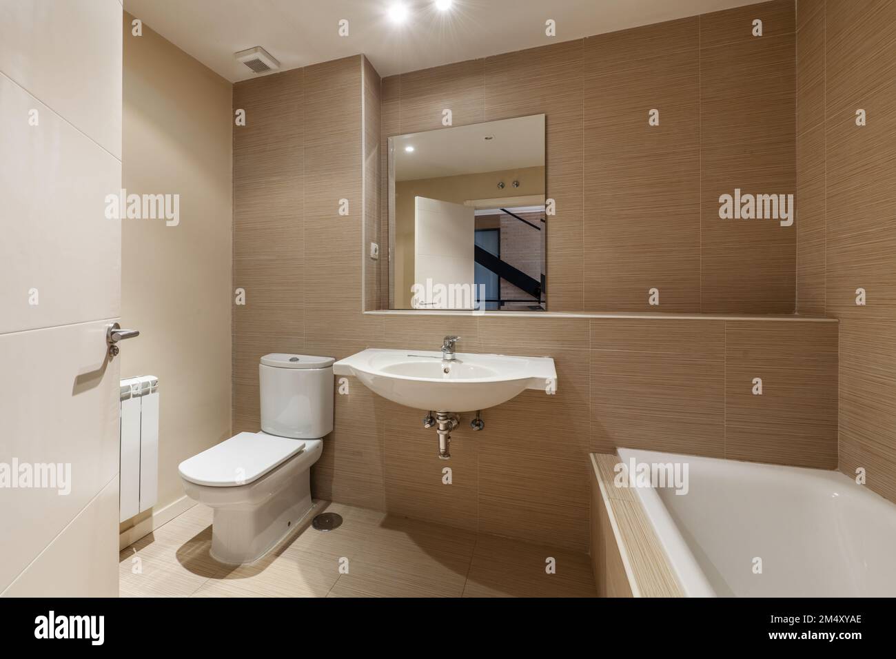 Bathroom with white porcelain sink without builtin shelf
