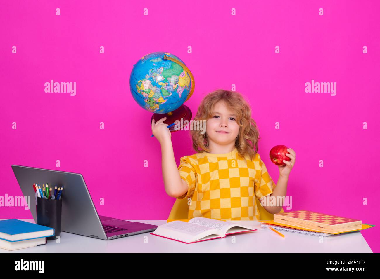 School child 7-8 years old with book go back to school. Little student. Stock Photo