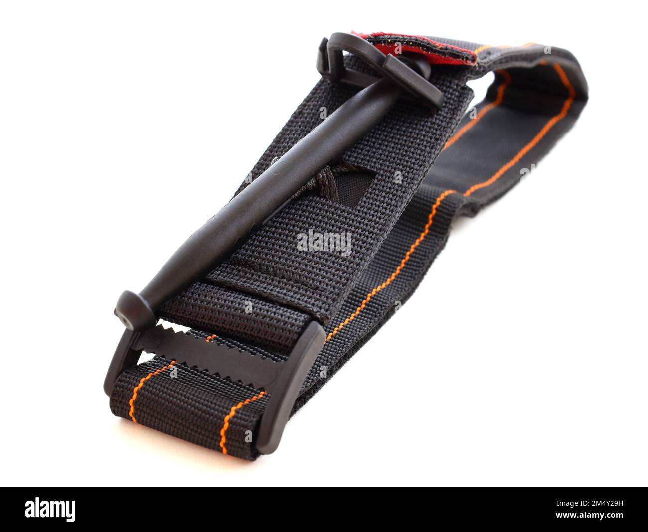 Hemostatic tourniquet on a white background top view. A tourniquet to