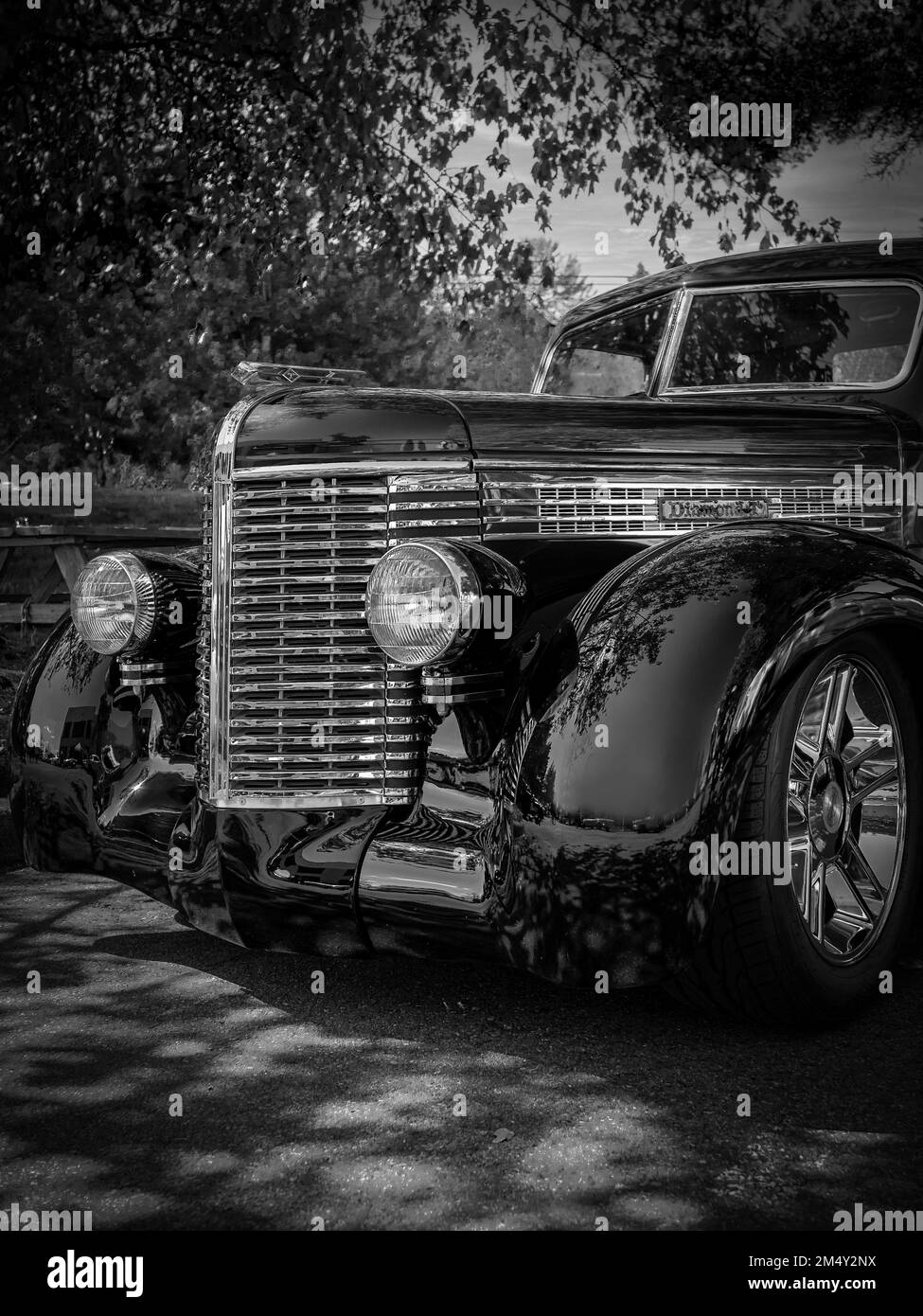 A shiny black Chevrolet Business Coupe at Classic Car Show in Woodinville, Washington, under the