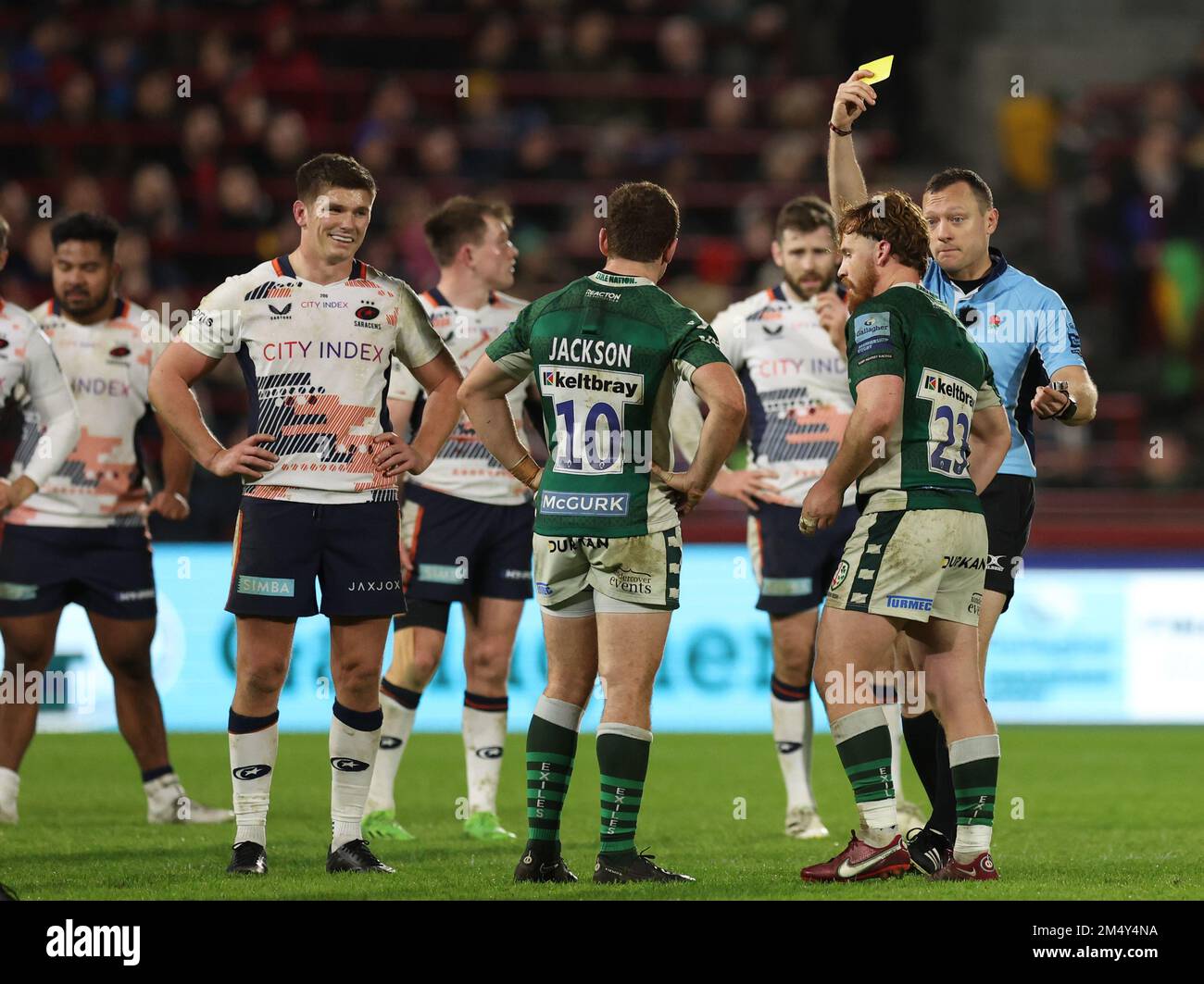 Referee Matthew Carley shows a yellow card to London Irish's Rory Jennings during the Gallagher Premiership match at the Gtech Community Stadium, London. Picture date: Friday December 23, 2022. Stock Photo