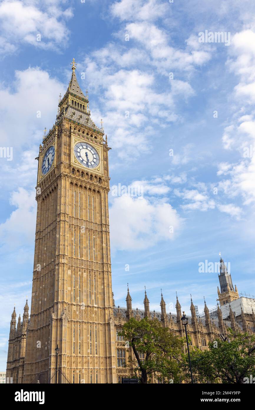 Elizabeth tower the popular Big Ben the largest clock tower in the world with a belfry, a landmark of London, England, low angle shot. Stock Photo