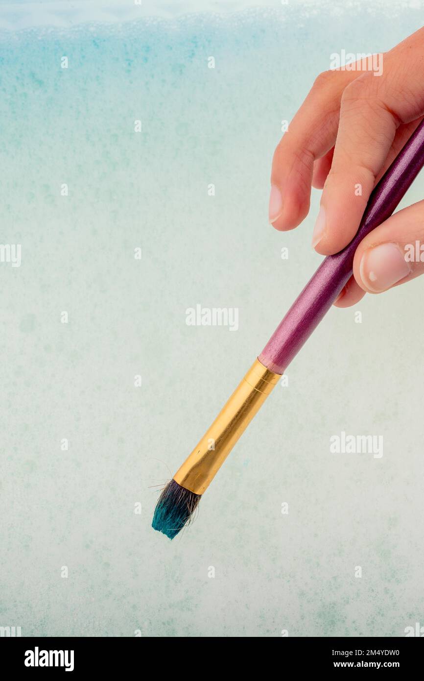 Hand covered in paint hi-res stock photography and images - Alamy