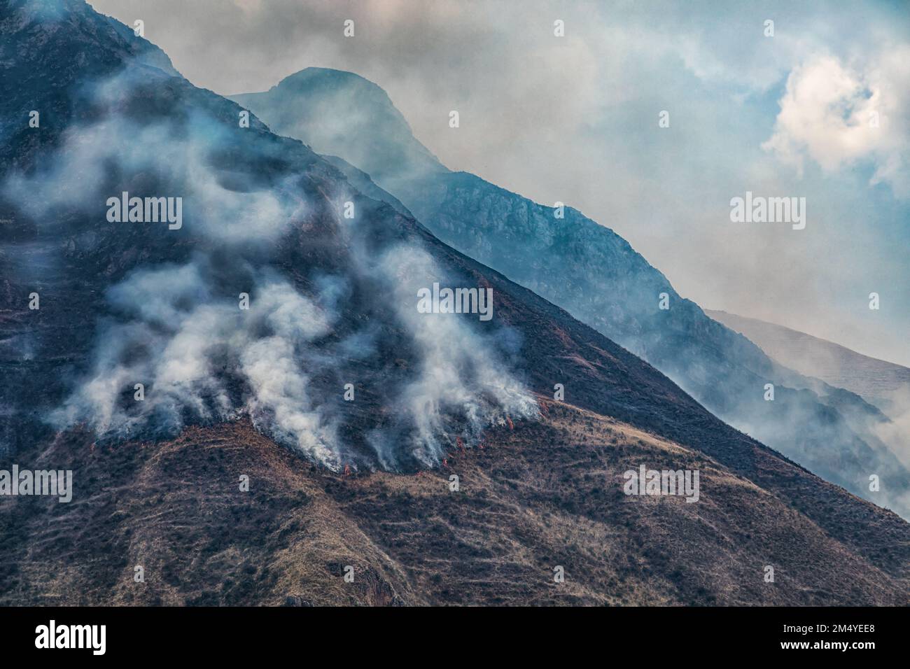 Aerial view of a forest fire in the Peruvian Andes near Cusco Stock ...