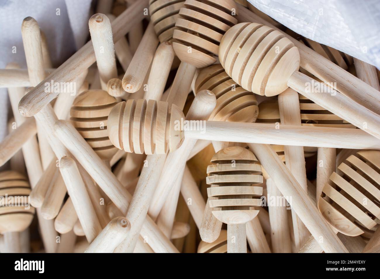 Set of honey dippers made of wood Stock Photo Alamy