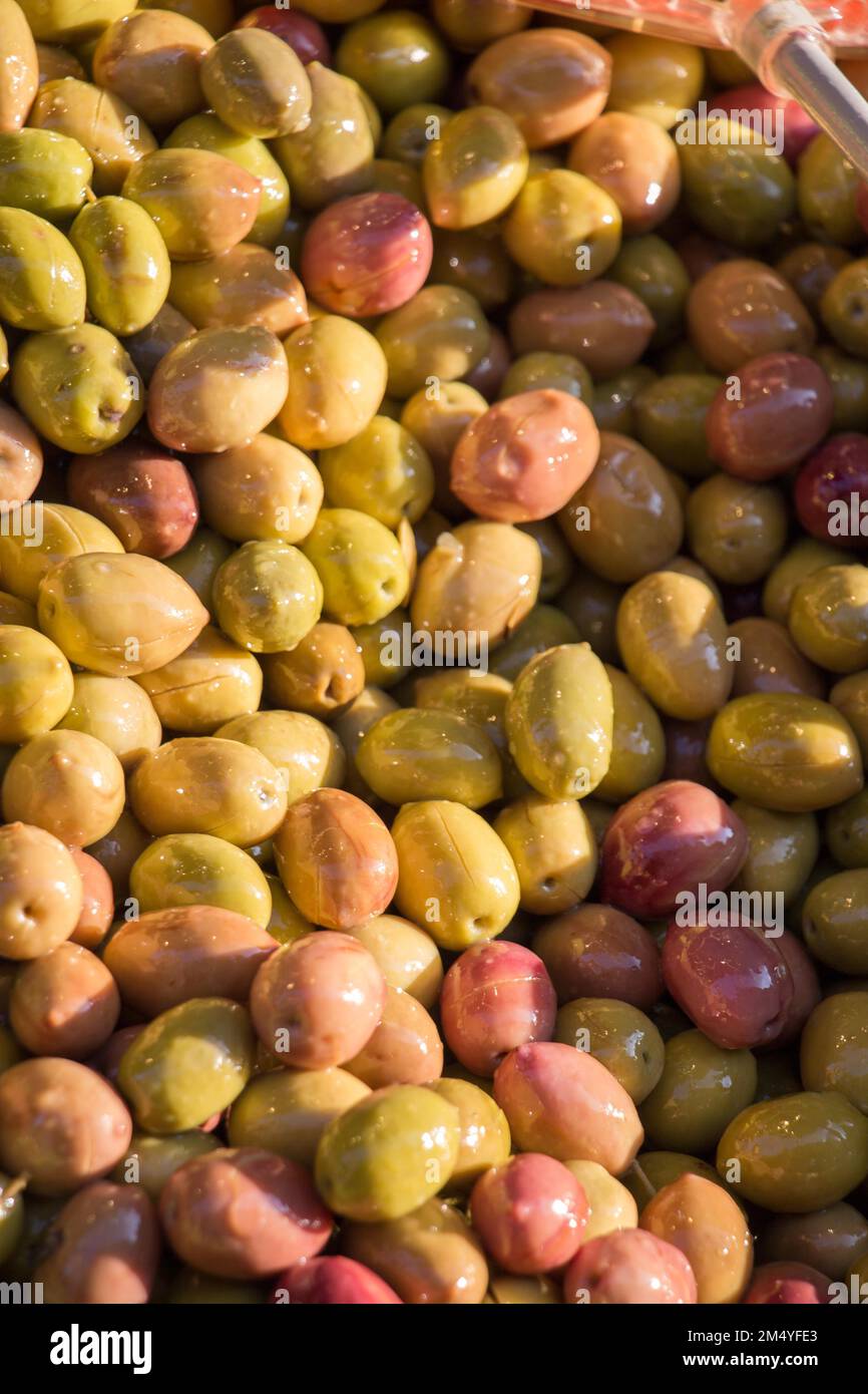 Turkish style prepared olives in the market stands Stock Photo