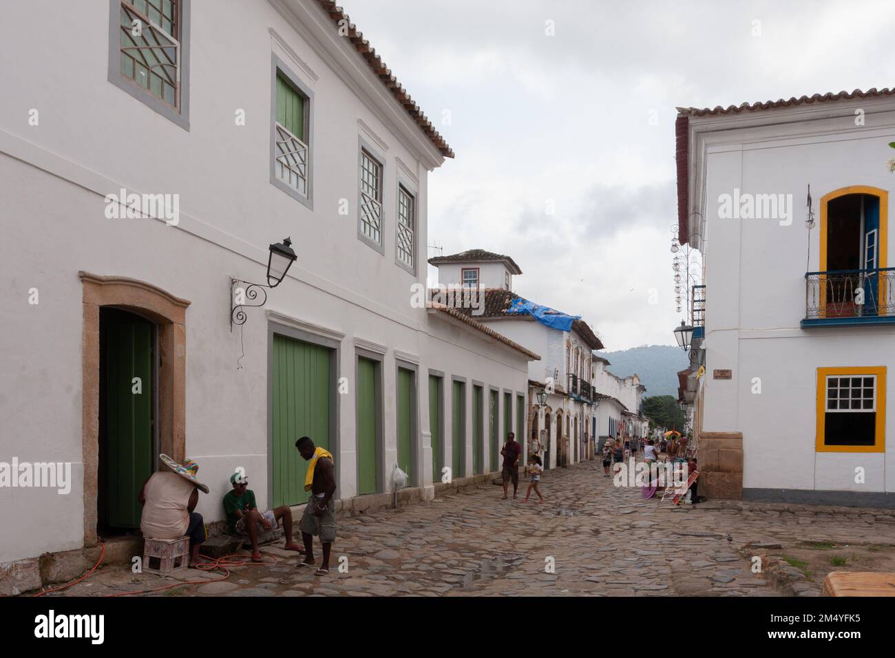 Paraty, RJ, Brazil. 27 December, 2012. A general view shows historic buildings and cobblestone paved streets in the Historic Center District of Paraty, Rio de Janeiro, Brazil. The historic center of Paraty, were inscribed on UNESCO World Heritage List in 2019 under the title 'Paraty and Ilha Grande'. Stock Photo