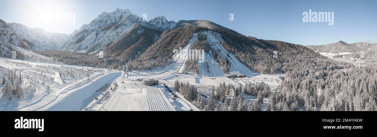 Ski Jump in Planica near Kranjska Gora Slovenia covered in snow at winter time. Aerial Panorama Stock Photo