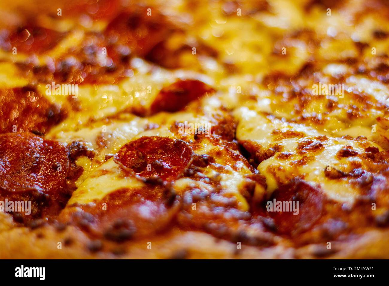 pepperoni pizza zoom, with cheese and ground meat Stock Photo Alamy
