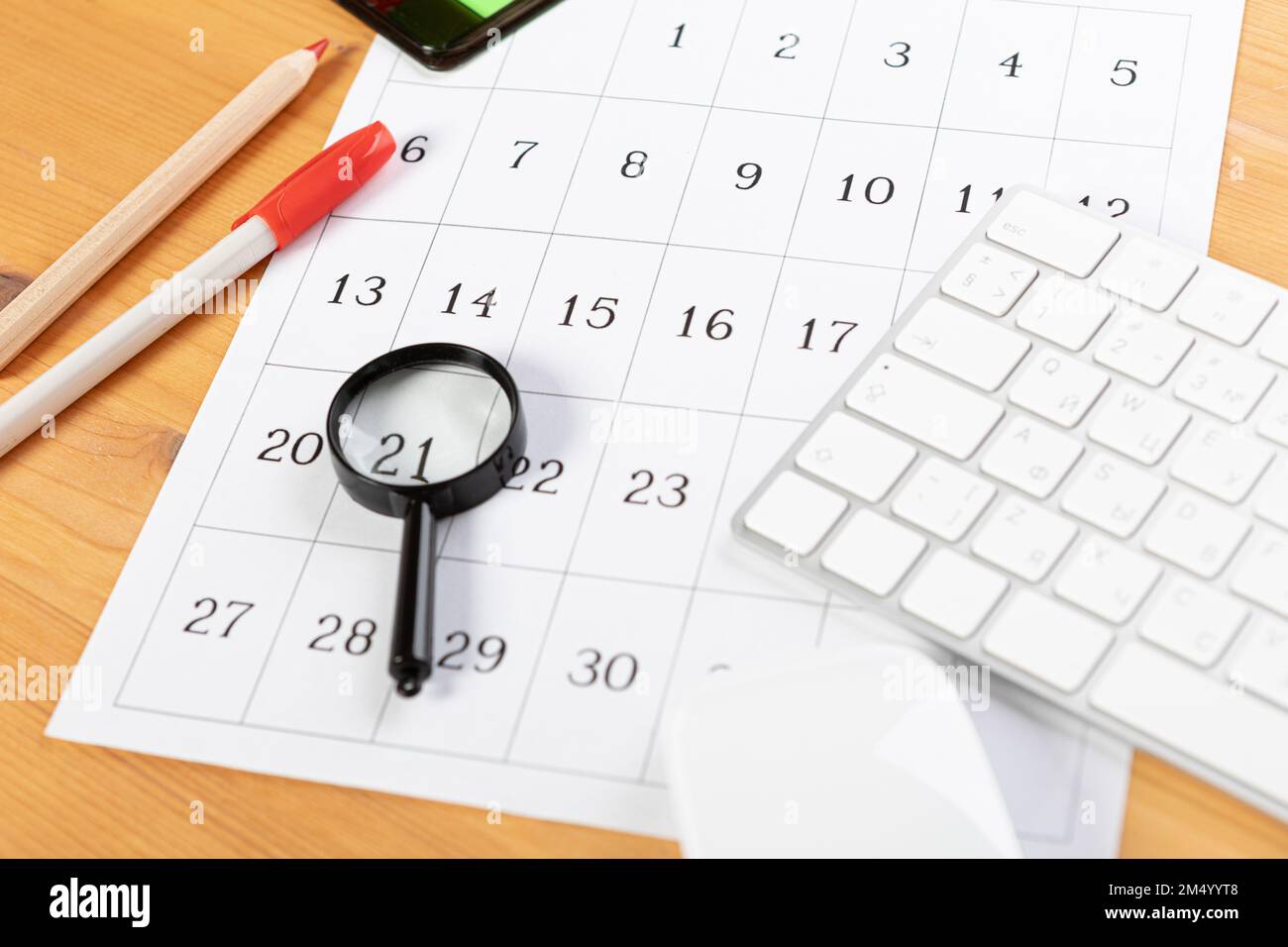 Calendar and reminders with magnifying glass, work from home online