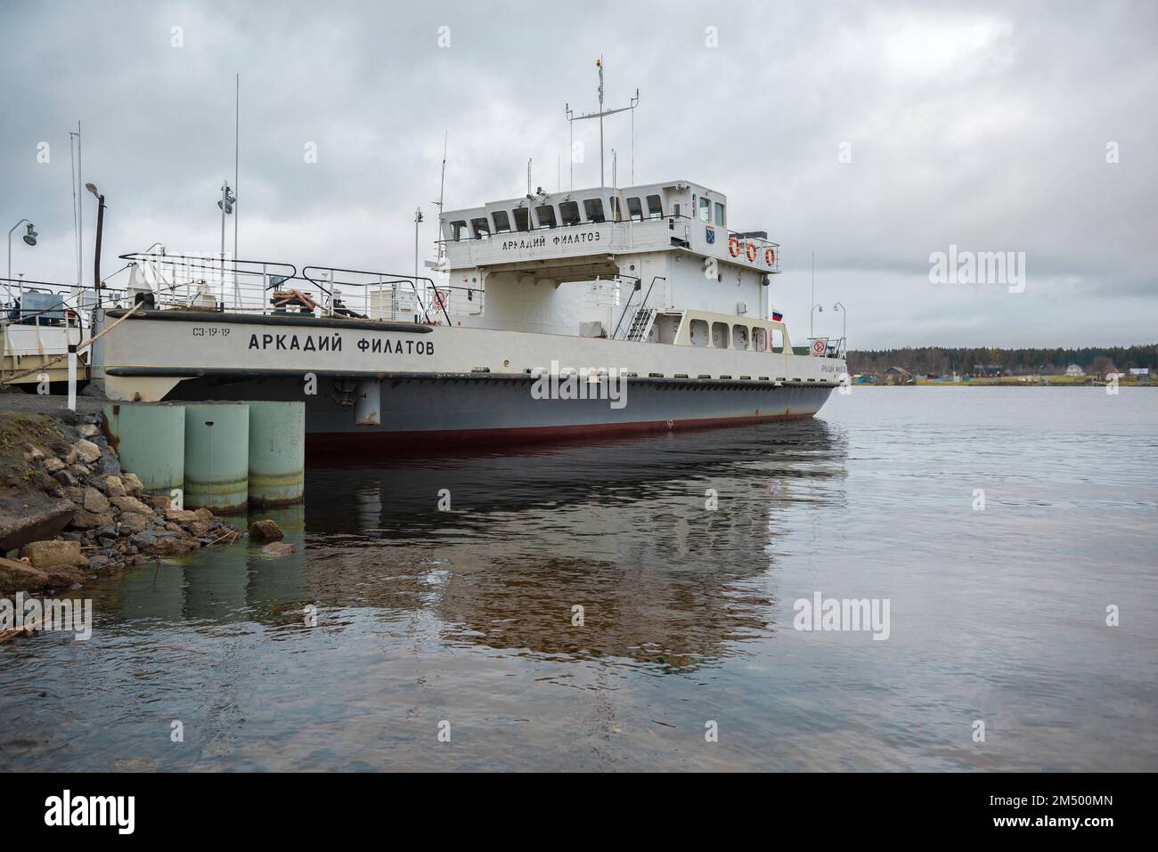 VOZNESENYE, RUSSIA - NOVEMBER 04, 2018: Ferry of 'Arkady Filatov' on the pier on a cloudy November day Stock Photo