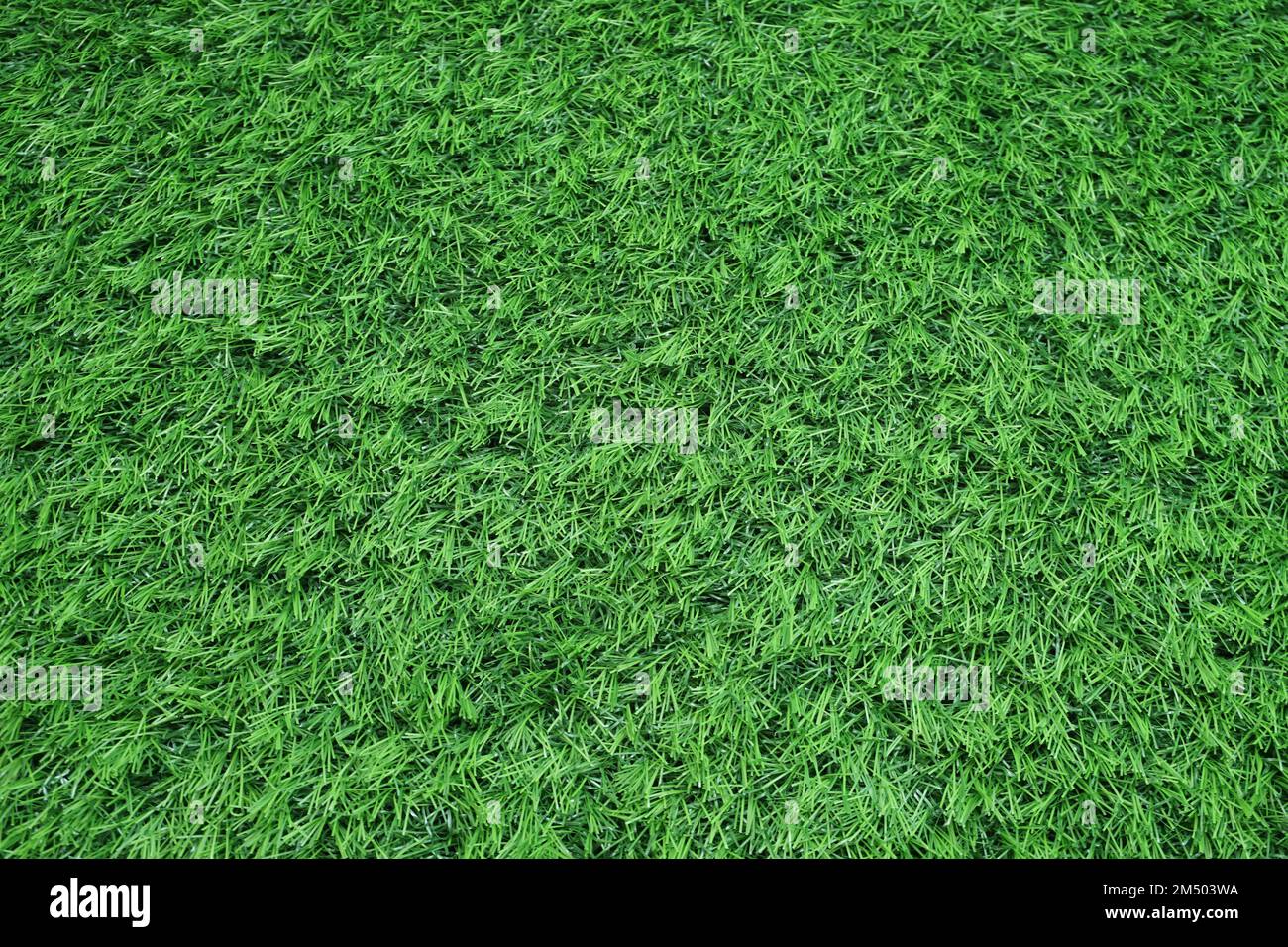 green artificial grass texture for background Stock Photo - Alamy