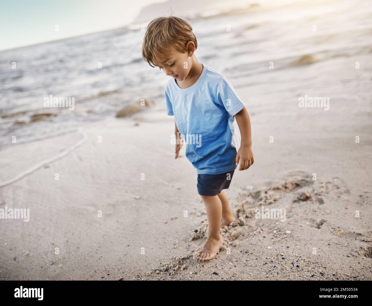 This little one loves fun under the sun. an adorable little boy at the