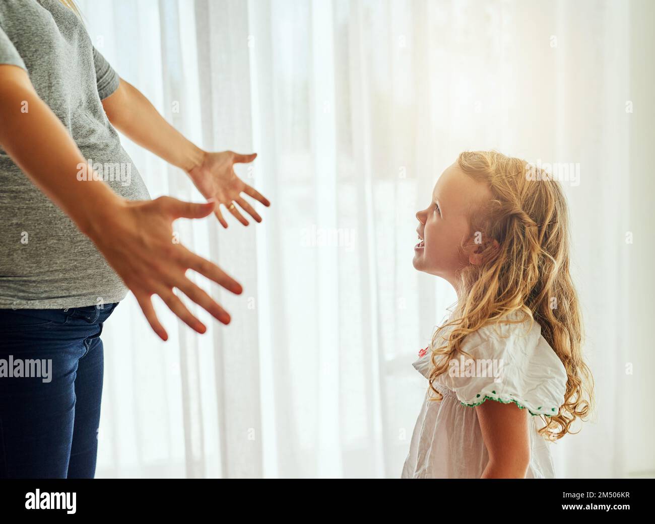 Youre still my first born. a pregnant woman reaching out for her little ...