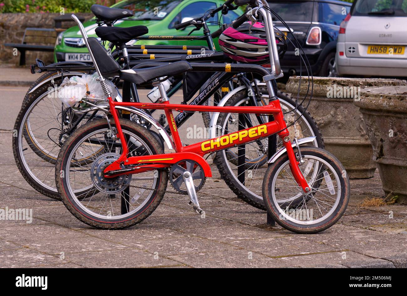 Vintage red Raleigh Chopper bicycle outdoors Stock Photo