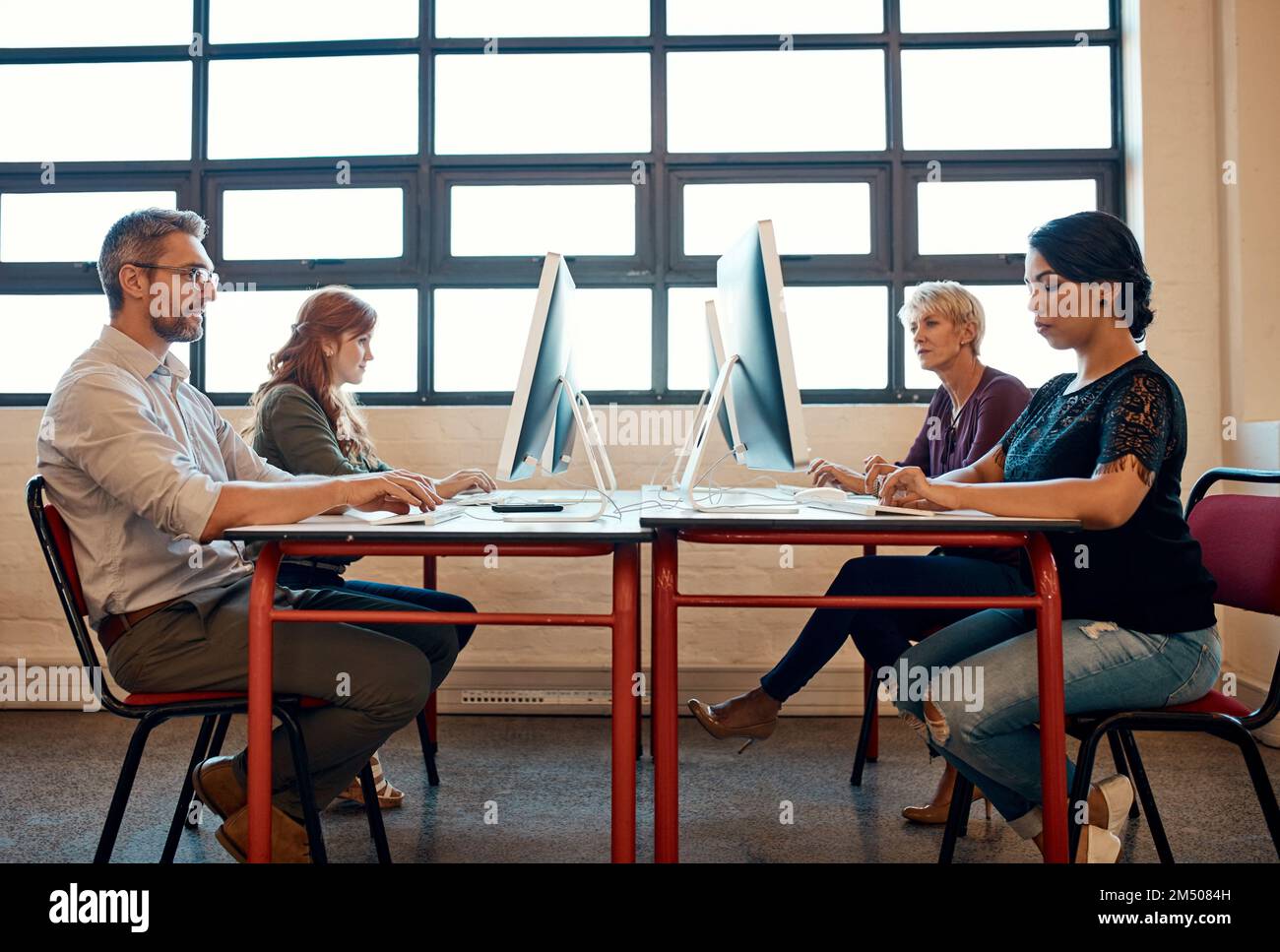 Focus is their secret to getting ahead. a group of businesspeople ...